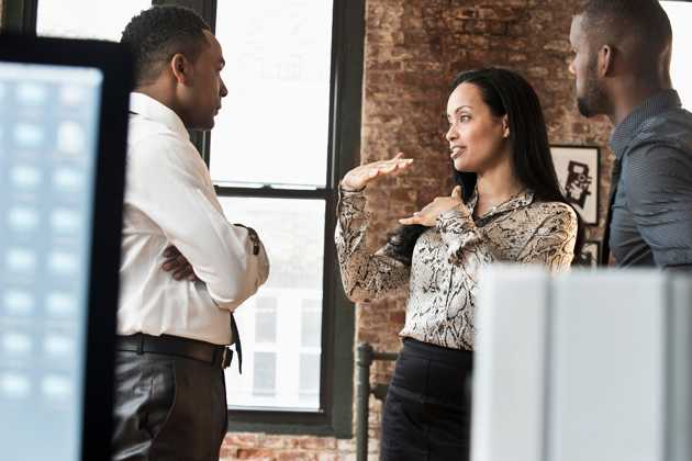 three people in discussion